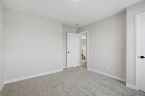 9 Bayview Mews Sw, Airdrie, AB - Indoor Photo Showing Other Room