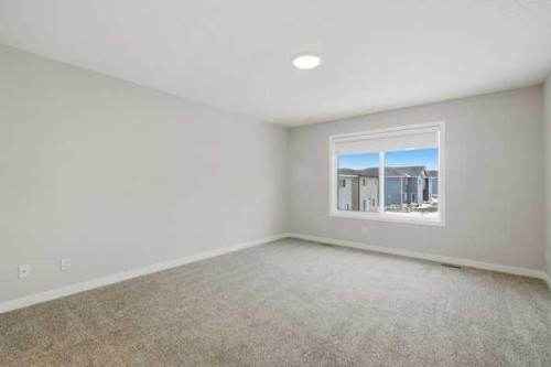 9 Bayview Mews Sw, Airdrie, AB - Indoor Photo Showing Other Room