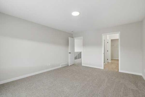 9 Bayview Mews Sw, Airdrie, AB - Indoor Photo Showing Other Room
