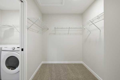 9 Bayview Mews Sw, Airdrie, AB - Indoor Photo Showing Laundry Room