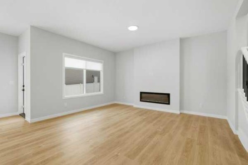 9 Bayview Mews Sw, Airdrie, AB - Indoor With Fireplace