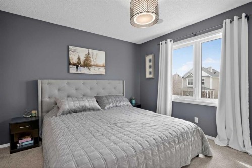 54 Tuscany Valley Rise Nw, Calgary, AB - Indoor Photo Showing Bedroom