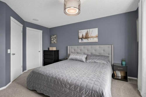 54 Tuscany Valley Rise Nw, Calgary, AB - Indoor Photo Showing Bedroom