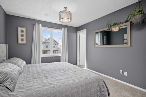 54 Tuscany Valley Rise Nw, Calgary, AB - Indoor Photo Showing Bedroom