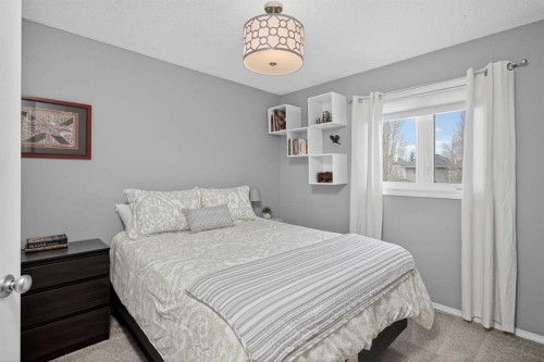 54 Tuscany Valley Rise Nw, Calgary, AB - Indoor Photo Showing Bedroom