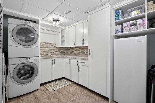 54 Tuscany Valley Rise Nw, Calgary, AB - Indoor Photo Showing Laundry Room