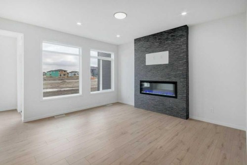 370 Corner Glen Way Ne, Calgary, AB - Indoor Photo Showing Living Room With Fireplace