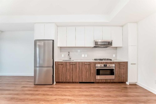 1313-730 2 Avenue, Calgary, AB - Indoor Photo Showing Kitchen With Stainless Steel Kitchen