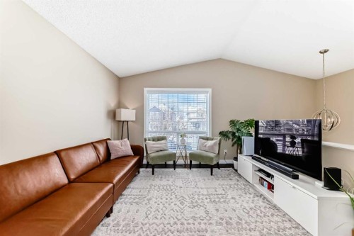67 Bridleglen Manor Sw, Calgary, AB - Indoor Photo Showing Living Room