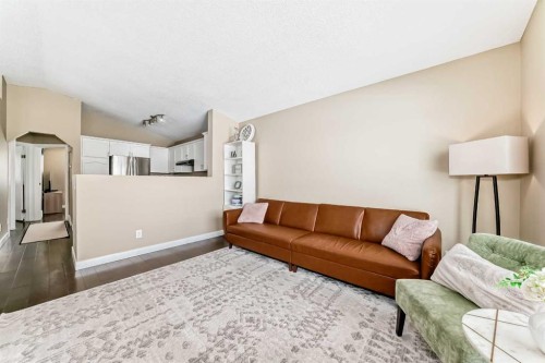 67 Bridleglen Manor Sw, Calgary, AB - Indoor Photo Showing Living Room