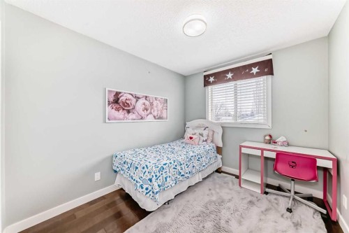 67 Bridleglen Manor Sw, Calgary, AB - Indoor Photo Showing Bedroom