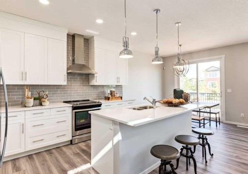 133 Versant Rise Sw, Calgary, AB - Indoor Photo Showing Kitchen With Double Sink With Upgraded Kitchen
