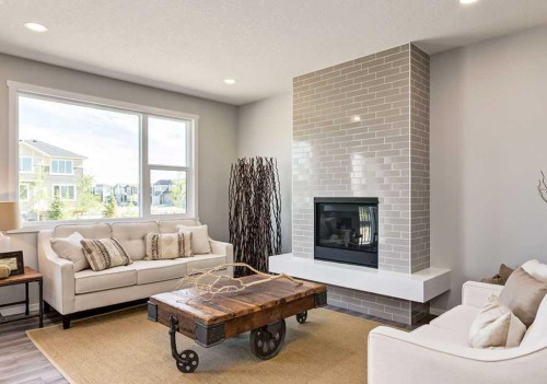 133 Versant Rise Sw, Calgary, AB - Indoor Photo Showing Living Room With Fireplace