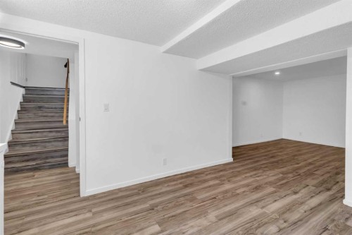 10 Radcliffe Crescent Se, Calgary, AB - Indoor Photo Showing Other Room
