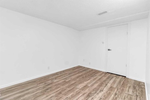 10 Radcliffe Crescent Se, Calgary, AB - Indoor Photo Showing Other Room