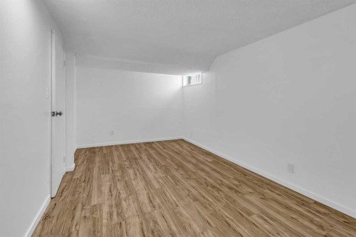 10 Radcliffe Crescent Se, Calgary, AB - Indoor Photo Showing Other Room