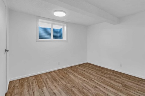 10 Radcliffe Crescent Se, Calgary, AB - Indoor Photo Showing Other Room