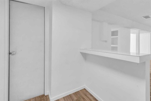 10 Radcliffe Crescent Se, Calgary, AB - Indoor Photo Showing Other Room