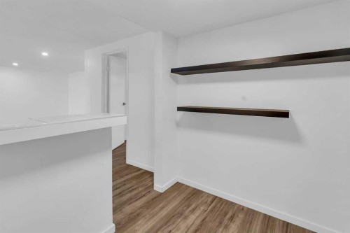 10 Radcliffe Crescent Se, Calgary, AB - Indoor Photo Showing Other Room