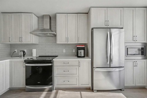 613 Sage Hill Grove Nw, Calgary, AB - Indoor Photo Showing Kitchen With Upgraded Kitchen