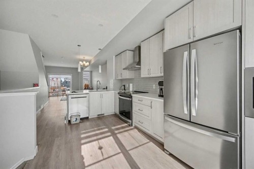 613 Sage Hill Grove Nw, Calgary, AB - Indoor Photo Showing Kitchen With Upgraded Kitchen