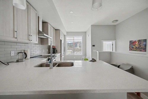 613 Sage Hill Grove Nw, Calgary, AB - Indoor Photo Showing Kitchen With Double Sink With Upgraded Kitchen
