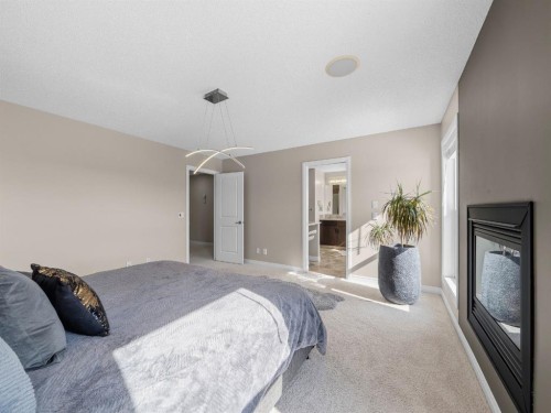 91 Silverado Ridge Crescent Sw, Calgary, AB - Indoor Photo Showing Bedroom