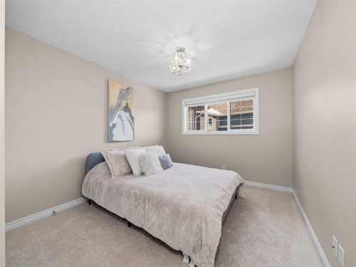 91 Silverado Ridge Crescent Sw, Calgary, AB - Indoor Photo Showing Bedroom