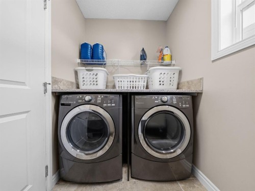 91 Silverado Ridge Crescent Sw, Calgary, AB - Indoor Photo Showing Laundry Room