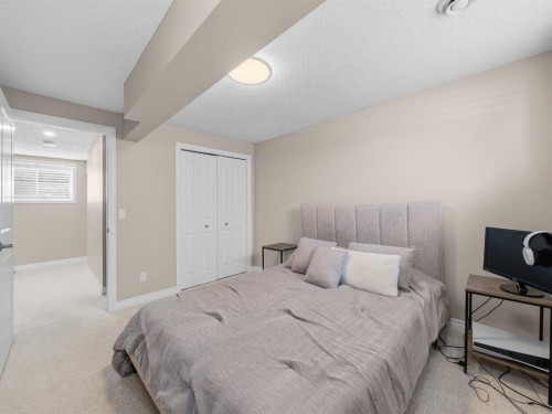91 Silverado Ridge Crescent Sw, Calgary, AB - Indoor Photo Showing Bedroom