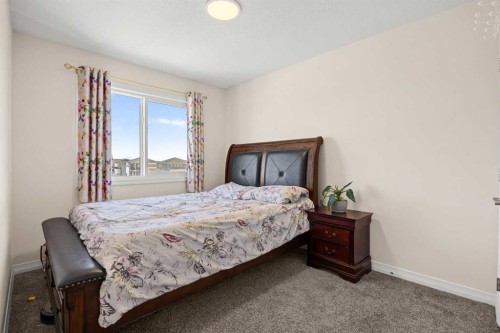 6 Corner Glen Common Ne, Calgary, AB - Indoor Photo Showing Bedroom