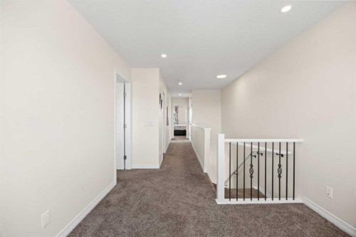 6 Corner Glen Common Ne, Calgary, AB - Indoor Photo Showing Other Room