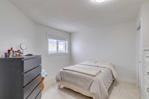 447 Tuscany Ridge Heights Nw, Calgary, AB - Indoor Photo Showing Bedroom
