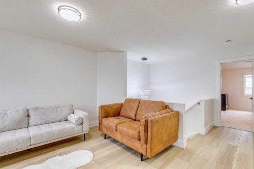 447 Tuscany Ridge Heights Nw, Calgary, AB - Indoor Photo Showing Living Room