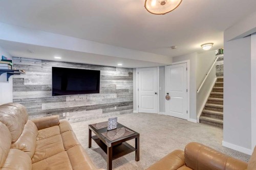 447 Tuscany Ridge Heights Nw, Calgary, AB - Indoor Photo Showing Living Room