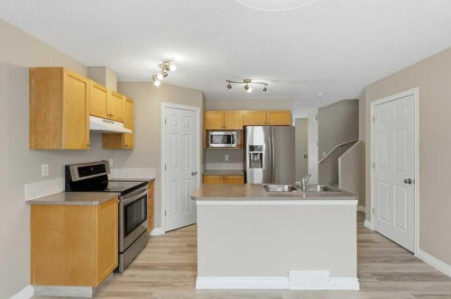 99 Covepark Square Ne, Calgary, AB - Indoor Photo Showing Kitchen With Stainless Steel Kitchen