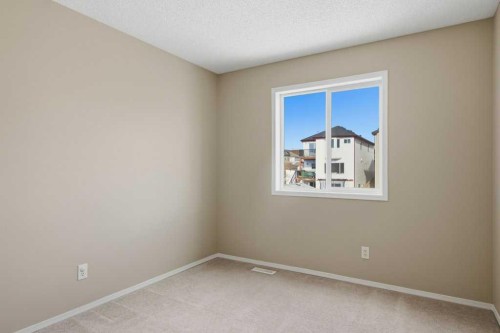 99 Covepark Square Ne, Calgary, AB - Indoor Photo Showing Other Room