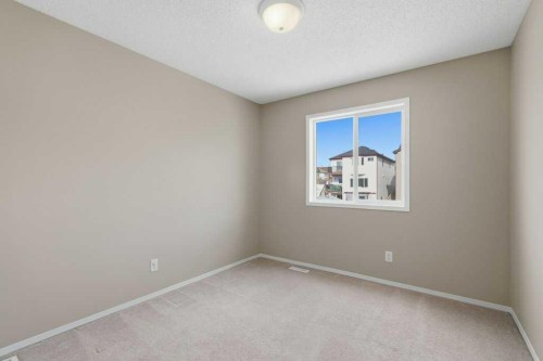 99 Covepark Square Ne, Calgary, AB - Indoor Photo Showing Other Room