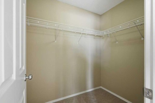 99 Covepark Square Ne, Calgary, AB - Indoor With Storage