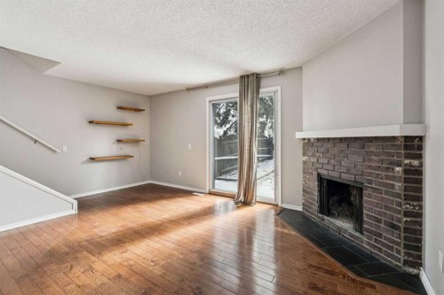 29-6503 Ranchview Drive Nw, Calgary, AB - Indoor With Fireplace