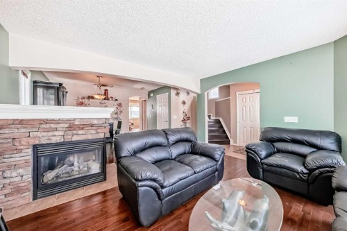 78 Taralea Manor Ne, Calgary, AB - Indoor Photo Showing Living Room With Fireplace