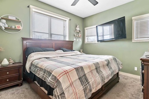 14 Sunrise Crescent Ne, High River, AB - Indoor Photo Showing Bedroom