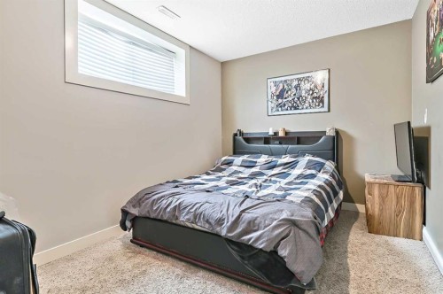 14 Sunrise Crescent Ne, High River, AB - Indoor Photo Showing Bedroom