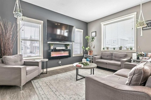 14 Sunrise Crescent Ne, High River, AB - Indoor Photo Showing Living Room With Fireplace