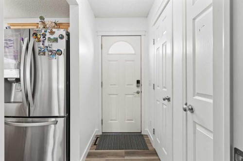 219 Silverado Plains Close Sw, Calgary, AB - Indoor Photo Showing Other Room