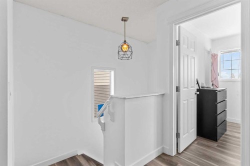 219 Silverado Plains Close Sw, Calgary, AB - Indoor Photo Showing Other Room