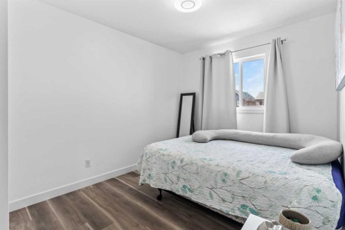 219 Silverado Plains Close Sw, Calgary, AB - Indoor Photo Showing Bedroom