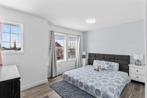 219 Silverado Plains Close Sw, Calgary, AB - Indoor Photo Showing Bedroom