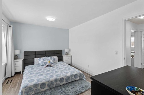 219 Silverado Plains Close Sw, Calgary, AB - Indoor Photo Showing Bedroom