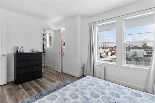 219 Silverado Plains Close Sw, Calgary, AB - Indoor Photo Showing Bedroom